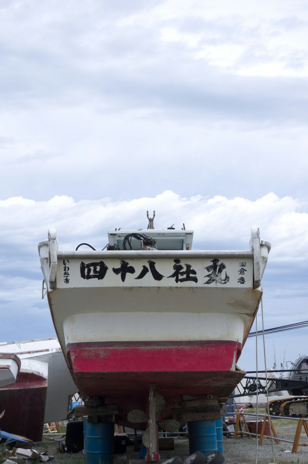 Small commercial vessel hauled out for maintenance and refit work